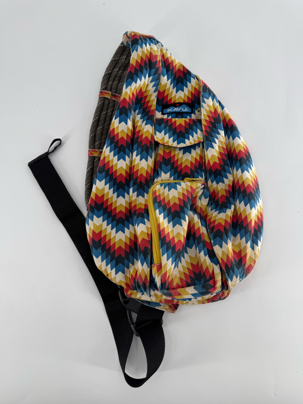 KAVU Rope Sling backpack in the "Cactus Bloom" pattern